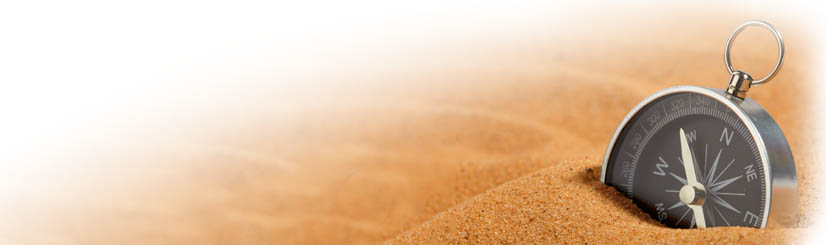 compass on beach