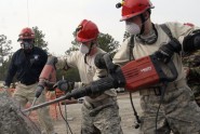 Soldiers from the Florida National Guard's CERF-P (Chemical, Biological, Radiological, Nuclear, and High Yield Explosive Enhanced Response Force Package) practice breaking up and removing rubble during the multi-agency Operation Integration exercise at Camp Blanding Joint Training Center, Fla., March 25, 2010. Photo by Master Sgt. Thomas Kielbasa