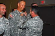 1st Lt. Christopher Barton with Troop C, 1st Squadron, 153rd Cavalry Regiment is pinned with the Pathfinder Torch after graduating from the U.S. Army Pathfinder course taught at Camp Blanding Joint Training Center by instructors from the Army National Guard Warrior Training Center, Sept. 23, 2011. Photo by Sgt. 1st Class Blair Heusdens