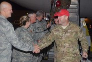Command of the 125th Fighter Wing Col. James Eifert (left) greets 202nd RED HORSE Airmen as they return home from deployment, Oct. 7, 2012. Photo by Debra Cox