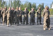 Members of the 930th Digital Liaison Detachment stand in formation during their departure ceremony in Homestead, Fla., Nov. 26, 2012. The Soldiers are deploying to Afghanistan to work with U.S. and coalition forces. Photo by Master Sgt. Thomas Kielbasa