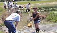 Students learning about water sampling. 