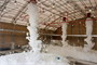 Foam tests, such as this one at a newly constructed aircraft hanger on Kandahar Airfield are critical to ensuring that fire suppression systems operate as designed. The U.S. Army Corps of Engineers oversaw dozens of these tests across south and west Afghanistan in 2011 and 2012.
