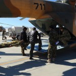 Afghan Air Force aircrew members watch as peers practice litter carries onto an Mi-17 helicopter on Nov. 20, 2012 , the Kabul, Afghanistan, International Airport. U.S. Air Force, AAF  and other coalition forces  members spent three days teaching basic medical training, medical and causality evacuation procedures to AAF flight engineers, pilots and aerial gunners. (U.S. Air Force photo/Staff Sgt. Melissa K. Mekpongsatorn)