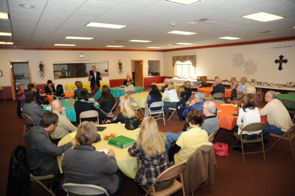 David Myers, Director of the DHS Center for Faith-based and Neighborhood Partnerships, addresses a Minot Community Organization Active in Disaster meeting.