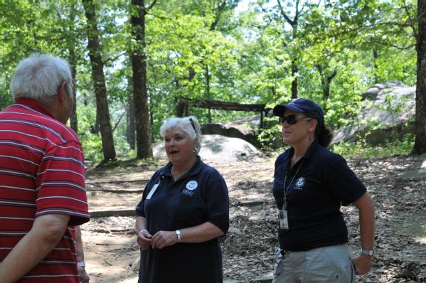 Community Relations specialists meet with disaster survivors.