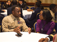 Lieutenant Gen. Willie J. Williams, director, Marine Corps Staff, speaks to a high school student during a mentoring session during the Black Engineer of the Year Awards at the Washington Marriott Wardman Park Hotel, Feb. 8. Fourteen Marine general officers provided guidance and mentorship to more than 300 high school students in attendance. 