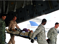 Transporting a casualty from the rear of an aircraft