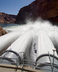 photo: water being released through river outlet tubes