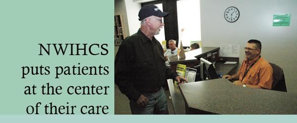 A clerk greets a Veteran at the Omaha VAMC