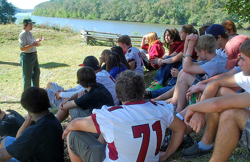 Forest Service archaeologist Rhonda Kimbrough gives an interpretive tour of historic Fort Gadsden on the Apalachicola National Forest in Franklin County, Fla., to middle school students late last year. More than 100 middle and high school students attended the event which directly relates to their current school curriculum. (U.S. Forest Service Photo/Susan Blake)