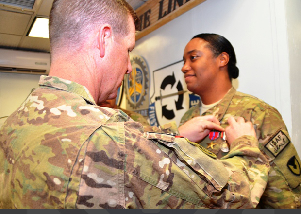 Sgt. 1st Class Bolden receives Bronze Star Medal.