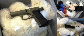 A disassembled gun and ammunition concealed in three stuffed animals.