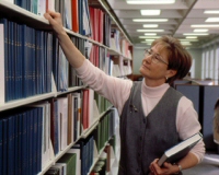 Librarian and bookshelves at the NIH library