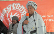 A traditional healer encourages people to step forward and test for HIV.     