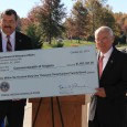 AMELIA, Va. — The Virginia Deparrtment of Veterans Services held a check presentation and groundbreaking ceremony at the Virginia Veterans Cemetery in Amelia Oct. 22, 2012, to mark a $1.6 million grant award to be used to retrofit the cemetery with double depth, pre-installed outer burial containers. Outer burial containers are similar to vaults and house the casket, protecting it from the elements. David Schettler, deputy undersecretary for management from the National Cemetery Administration, presented DVS Commissioner Paul Galanti with a ceremonial check as part of the event. “Pre-installation of outer burial containers will bring Virginia’s state cemeteries up to the standards of national veterans cemeteries, such as Quantico and Culpeper,” explained Galanti. “Federal cemeteries provide outer burial containers to...