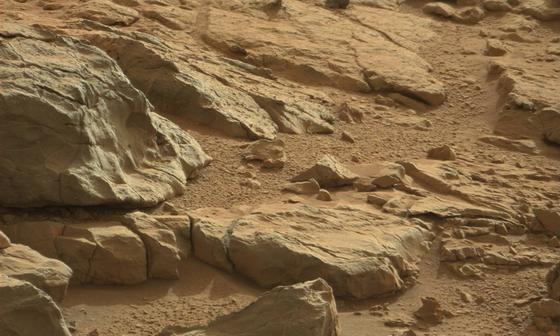 read the article 'Mars Rock Takes Unusual Form'