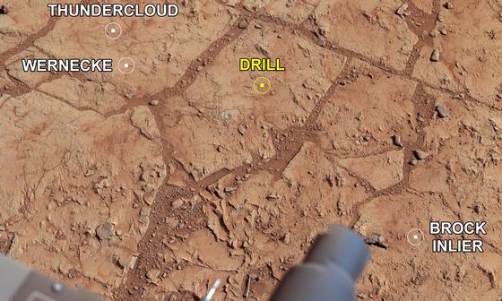 read the article 'Investigating Curiosity's Drill Area'