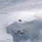 Skier fleeing avalanche pulls off epic backflip