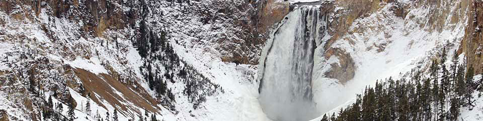 Snow and ice cover the Lower Falls of the Yellowstone River.