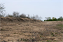 The "J-levee" (left) severs the connection between the river and floodplain near Hamilton City, Calif. "The majority of the old levee will be removed in order to reconnect the river to the natural floodplain, and only areas of the old levee with significant environmental benefits will be left in place," Corps project manager Tom Karvonen said.