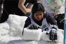 2nd Lt. Zully Pasindo-Rubio, First World Igloo Building Championship competitor, works on her team