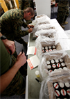 On Nov. 30, Maj. Gen. Ray Fox, commanding general II Marine Expeditionary Force, ordered a MEF-wide urinalysis for the nearly 53,000 active-duty Marines and sailors aboard Marine Corps Base Camp Lejeune. Samples were collected from men and women and shipped for analysis before the end of the day, as a part of the detection phase of the II MEF Counter Drug Campaign to preserve the force and its readiness. (Official Marine Corps photo by Cpl. Daniel A. Wulz)