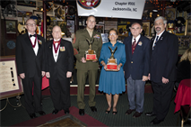 The Down East Chapter of the Non Commissioned Officers Association of America presented Sgt. Maj. Robert G. VanOostrom, the II Marine Expeditionary Force sergeant major, its annual Sergeant Major C.A. "Mack" McKinney Awards Ceremony, Feb. 8, at Sywanyks Scarlet and Gold Traditions in Jacksonville, N.C.