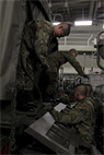 ABOARD USS BOXER (LHD-4), Calif. - Members of the Japan Ground Self Defense Force unload their vehicle for refueling during Exercise Iron Fist 2013, aboard USS Boxer (LHD-4), Calif. Feb. 8, 2013. During Exercise Iron Fist 2013, the 13th MEU and Japan Ground Self Defense Force will spend three weeks participating in bilateral training to improve their interoperability, enhance military-to-military relations, and sharpen skills essential to crisis response. (U.S. Marine Corps photo by Lance Cpl. David Gonzalez/ Released)