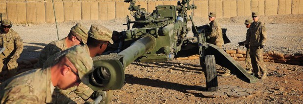 A U.S. Army gun crew runs through drills on the M777 howitzer at Forward Operating Base Hadrian. The Soldiers of 1st Section, Bravo Battery, 1st Battalion, 9th Field Artillery Regiment from Fort Stewart, Ga., have been conducting intensive training and fire missions to support operations in Uruzgan province, Afghanistan. (Photo by Capt. Jesse Platz, 7th Battalion, The Royal Australian Regiment Task Group)