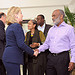 Secretary of State Hilary Clinton shakes hands with former President of Haiti Rene Preval