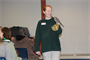 Raptor Center employee Laura Freeman talking about an American kestrel with a group at Gavins Point