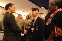 Sgt. Maj. Angela M. Maness, Marine Corps Air Station Cherry Point sergeant major, thanks Johnnie Thompkins Jr. for his military service after a ceremony celebrating the legacy of the Montford Point Marines Friday.