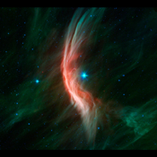 The giant star Zeta Ophiuchi, a young, large and hot star located around 370 light-years away, is having a 'shocking' effect on the surrounding dust clouds in this infrared image from NASA's Spitzer Space Telescope.