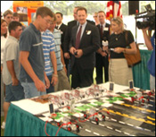 Hands-on activities, such as the fuel cell car race shown in the photo, allow students to delve into hydrogen and fuel cell technologies.