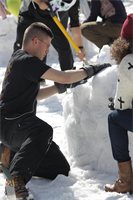 Pfc. Alexander Uribe, First World Igloo Building Championship competitor, works on his team's igloo during the event, which took place at the Osorakan Snow Park, located in the town of Akiota, Feb. 3, 2013. Japanese media could be heard over the loud speakers interviewing participants throughout the competition.