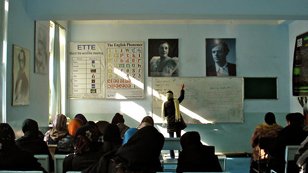 Photo of English Language Specialist and Classroom