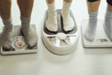 Image-people on weight scales