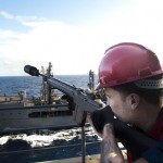 A shot line is fired to USNS Laramie before an unrep