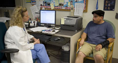 Patient being consulted by staff.