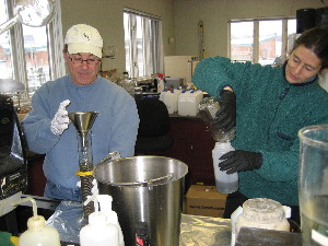 USGS scientists processing samples of combined sewer overflow water collected after a storm. The samples were analyzed for selected wastewater-related chemicals.