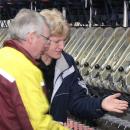 Kevin Lordan, USAID consultant, and Maria Ciolacu, Filatura Ungheni Director, analyze yarn quality. (PHOTO: USAID CEED II PROJECT)