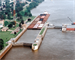 Lock and Dam 12 is located near Bellevue, Iowa, 556.7 miles above the confluence of the Mississippi River and Ohio River. The lock opened in 1938 and is 110 feet wide by 600 feet long. 