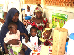 Women and children await treatment