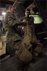 Marines and Sailors assigned to Battalion Landing Team (BLT) 3/2, 26th Marine Expeditionary Unit (MEU), load their gear a Light Armored Vehicle during an alert status drill in the well deck of USS Kearsarge (LHD 3), Jan. 27, 2013. The MEU and Amphibious Squadron (PHIBRON) 4 are conducting PHIBRON-MEU Integration in preparation for their Composite Training Unit Exercise, the final phase of a six-month pre-deployment training program. The 26th MEU operates continuously across the globe, providing the president and unified combatant commanders with a forward-deployed, sea-based quick reaction force. The MEU is a Marine Air-Ground Task Force capable of conducting amphibious operations, crisis response and limited contingency operations. (U.S. Marine Corps photo by Cpl. Christopher Q. Stone/Released)