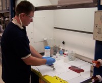 USGS scientist processes soil samples in for laboratory analysis for the presence of pharmaceuticals