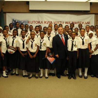 Photo: Deputy Public Affairs Officer Roberto Quiroz II with Tegeta Secondary School students at the U.S. Embassy in Dar es Salaam on February 7, 2013.
