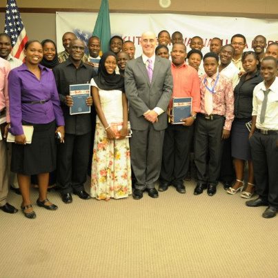 Photo: Deputy Chief of Mission Robert K. Scott with guests following the film screening program and discussions on combating human trafficking.