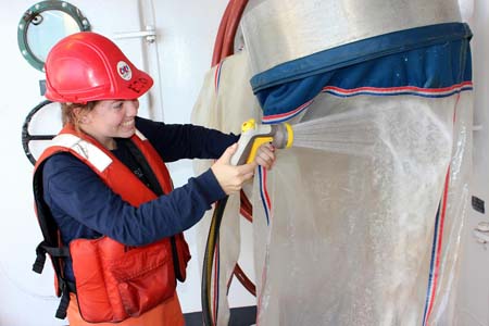 washing a plankton sample from the bongo net