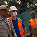 Individuals are pictured at a construction site